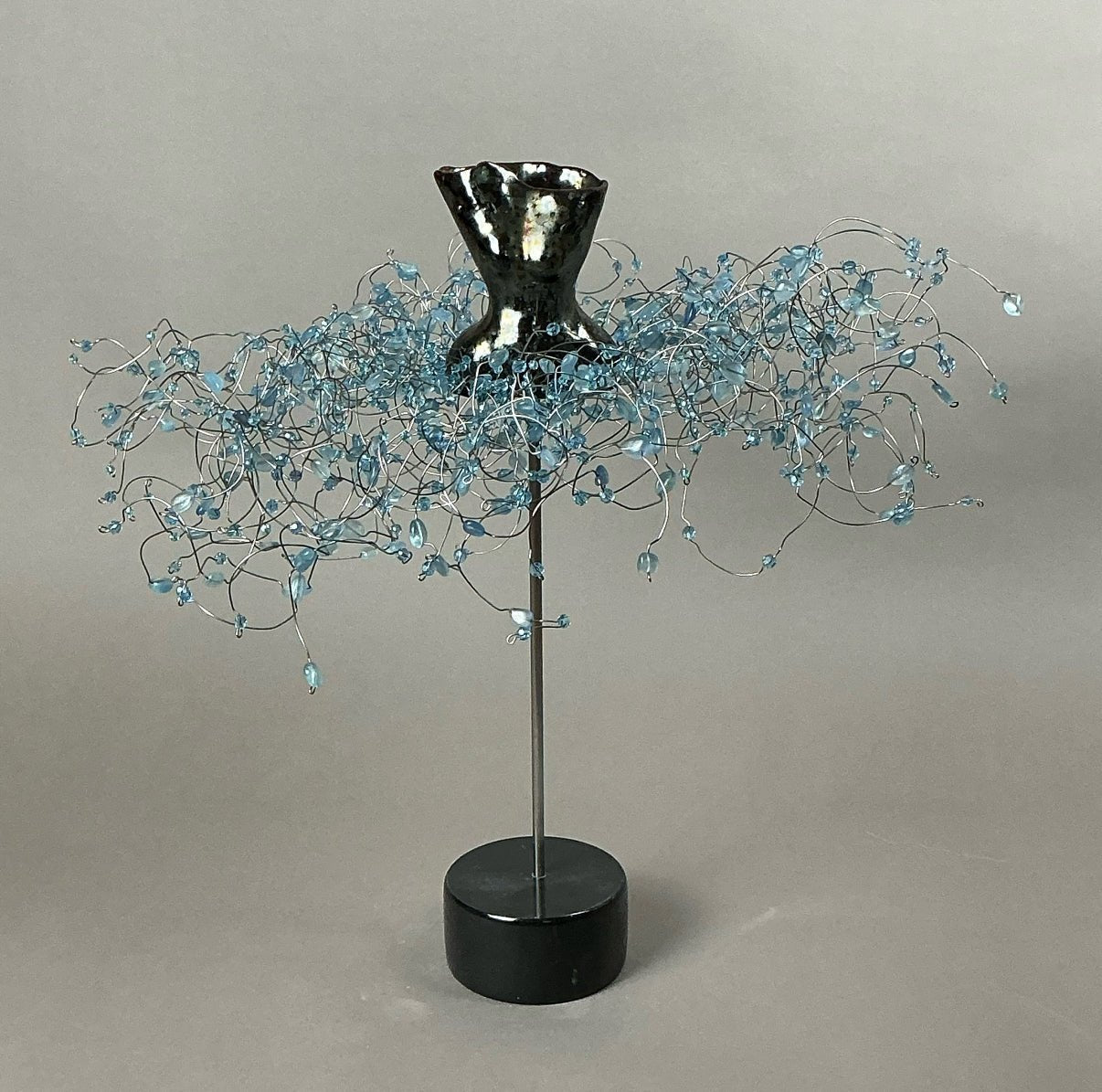 High Fired Clay Torso with Topaz/Blue European Crystals on Black Base by Estella Fransbergen at LePrince Galleries